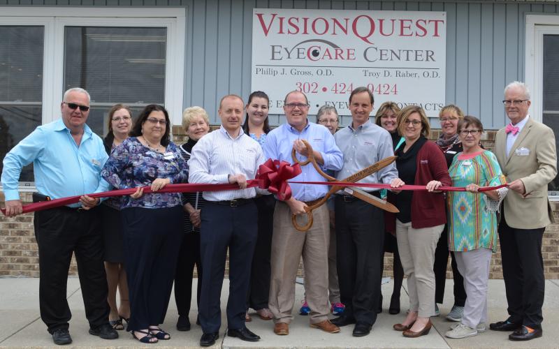 Celebrating the ribbon cutting for Vision Quest Eye Care Center are in back (l-r) Dana Patone, CCGM ambassador Barbara Steele, Renee Baker, Penny Scott, CCGM ambassador Donna Thompson and CCGM Secretary Jennifer Jurczak. In front are CCGM board member Mike Baker, CCGM ambassador Susan Long, Dr. Aaron Yatskevich, Dr. Troy Raber, Dr. Philip Gross, practice manager Sarah Heritage, CCGM Vice President Alicia Hollis and CCGM President Darel LaPrade. SUBMITTED PHOTO